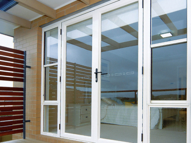 Modern building equipped with Energy Efficient Door Systems for reduced energy consumption