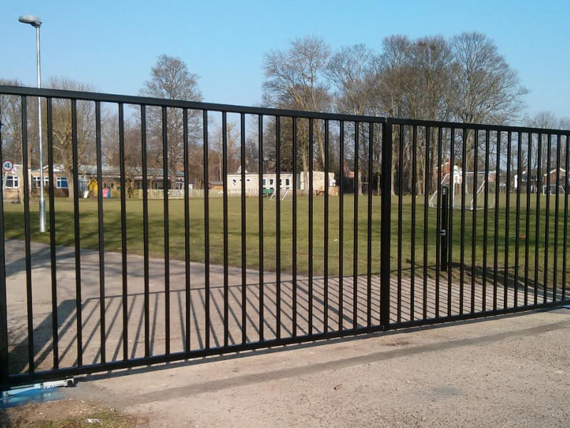 Sliding gate system connected to keypad and RFID access control unit