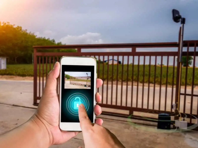 Home entry with Smart Door Automation IoT system using mobile phone and biometric authentication