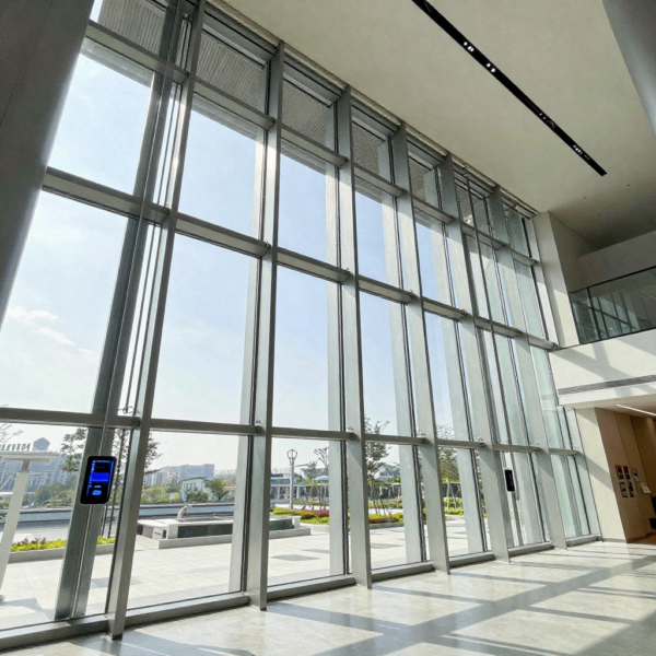 Modern atrium ventilation using smart window control system and automated skylights.