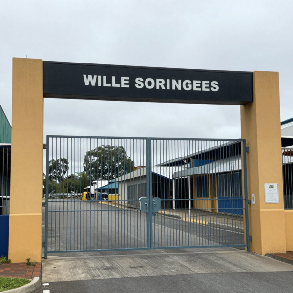 Outdoor siren for industry installed on factory wall for alarm and evacuation alerts