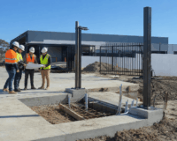 Learn cantilever gate concrete slab requirements coming with builder-focused guidance on footings, conduits, motor pads, drainage and automation setup.