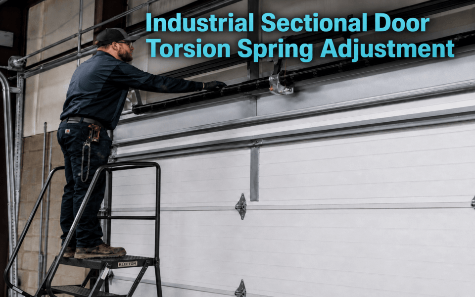 Industrial Sectional Door Torsion Spring Adjustment: A Critical Safety Guide for Installers